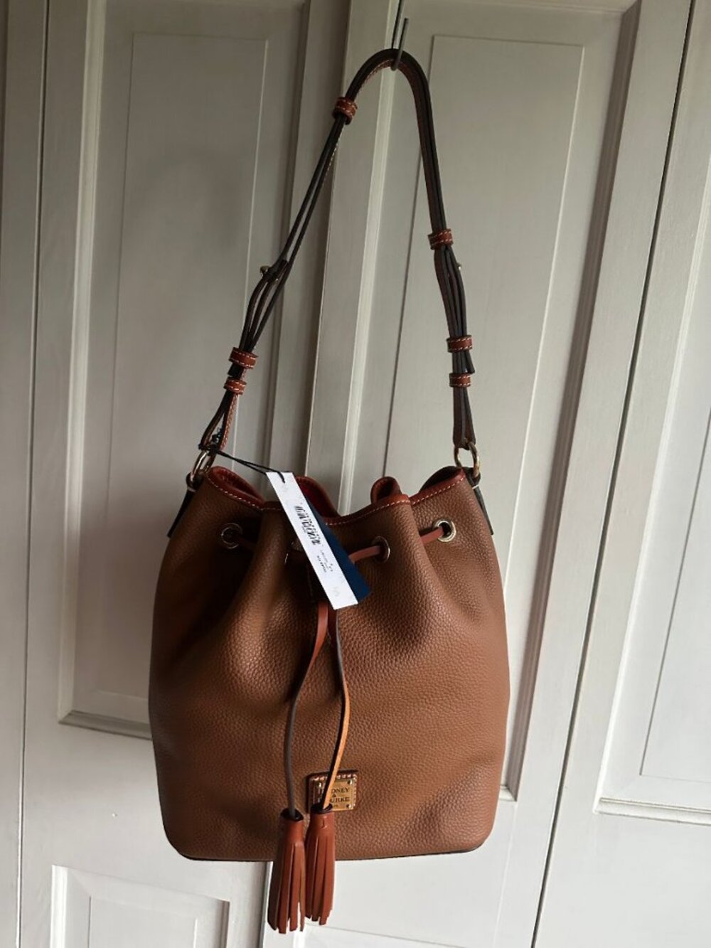 NWT Dooney & Bourke Pebbled Leather Caramel Drawstring Bag With Dust bag